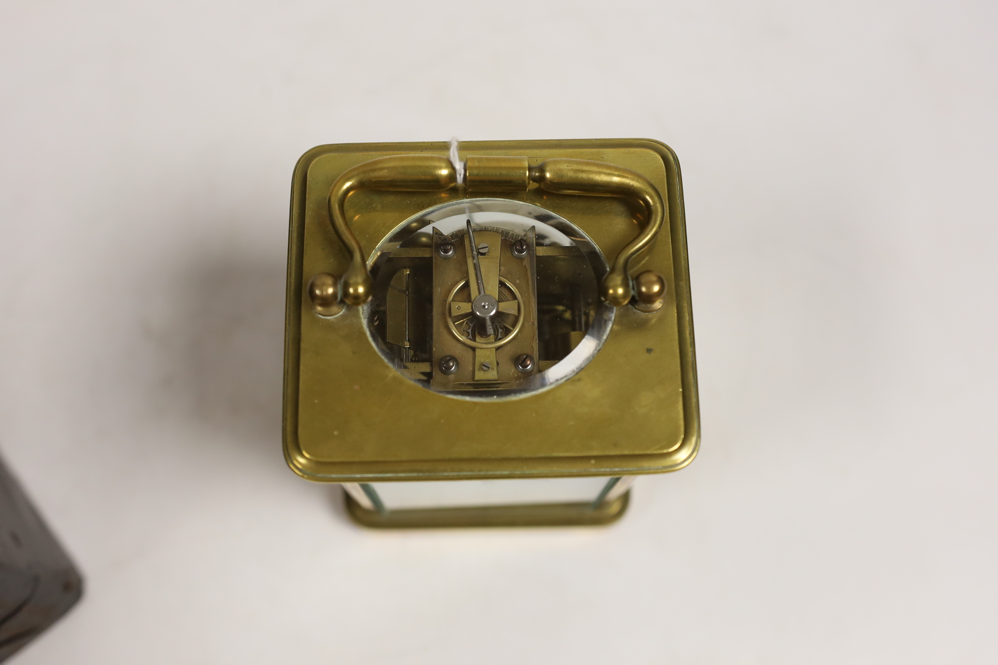 A late 19th century French carriage clock, with alarm, portable in case, clock 14cm high